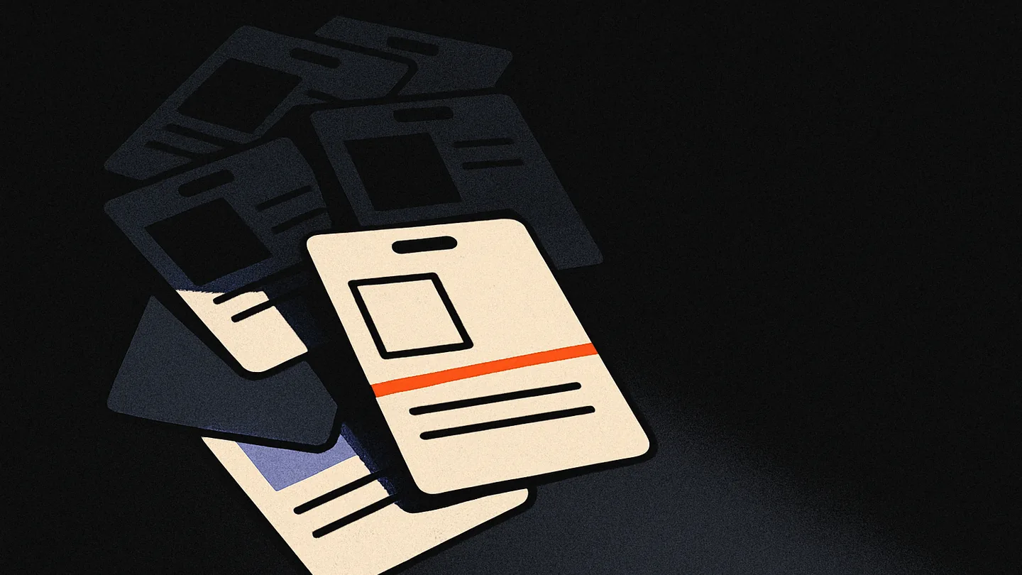 A scattered pile of badge-scan slips on a dark desk, one slip marked with a thin ember-orange line and pulled forward from the rest.