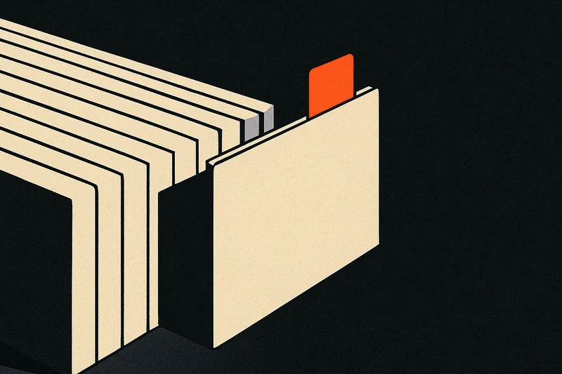 A row of index cards split into two groups on a dark desk, one card marked with an ember-orange tab.