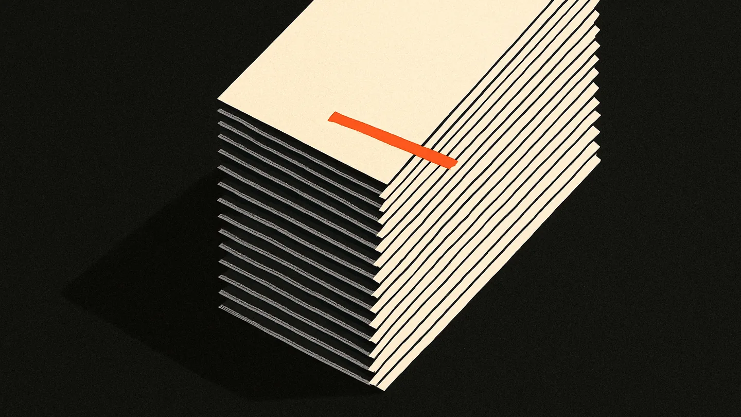 A stack of index cards on a dark desk, one card out of alignment and struck through with an ember-orange line.
