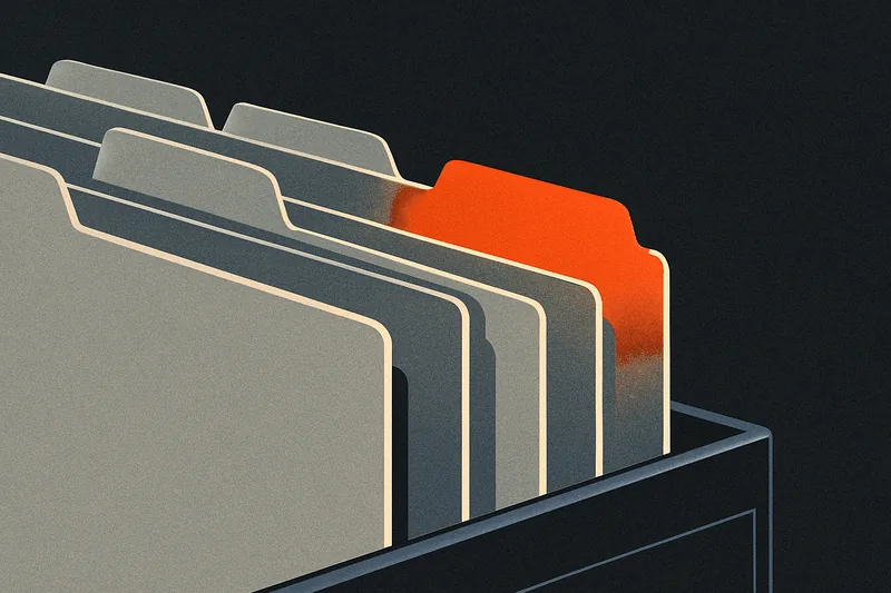 A row of file-folder tabs standing in a dark drawer, one tab glowing ember-orange brighter than the others.